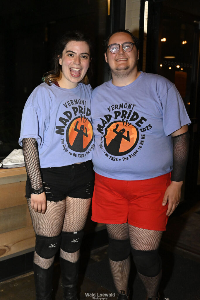 Neilah and friend with matching Mad Pride shirts before performance